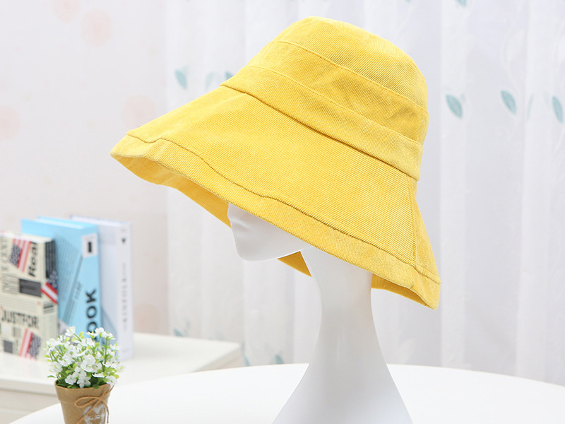 What outfit does a fisherman's hat look good with